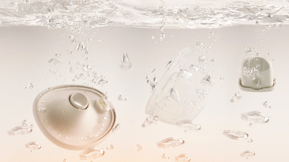 Breast pump parts under water