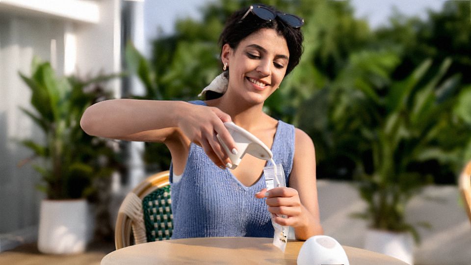 Mum using eufy Wearable Breast Pump